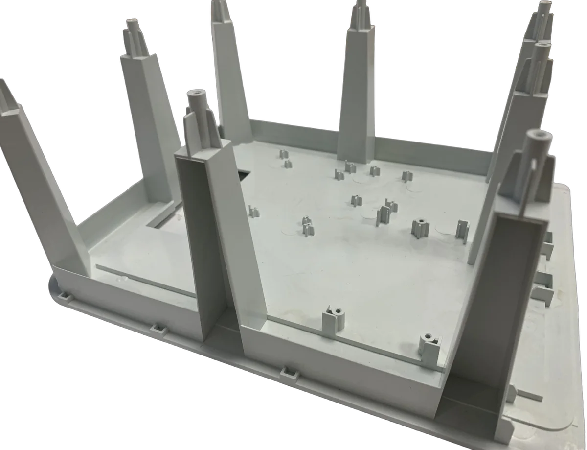 White plastic base with moulded standoffs