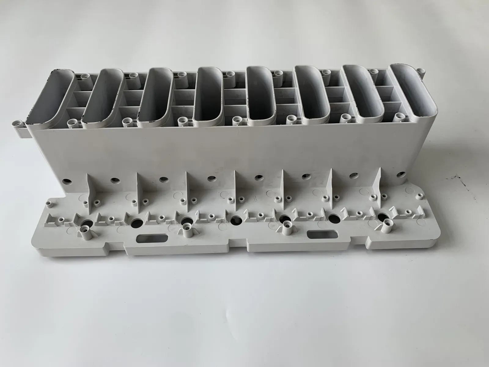Automotive structural bracket moulded part