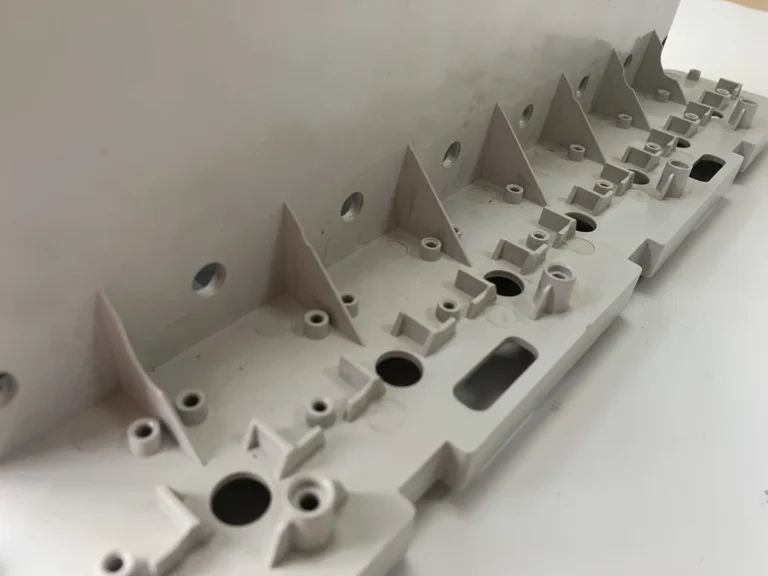 Multi-cavity mould plate assembled and checked on the fitting bench before mould trials